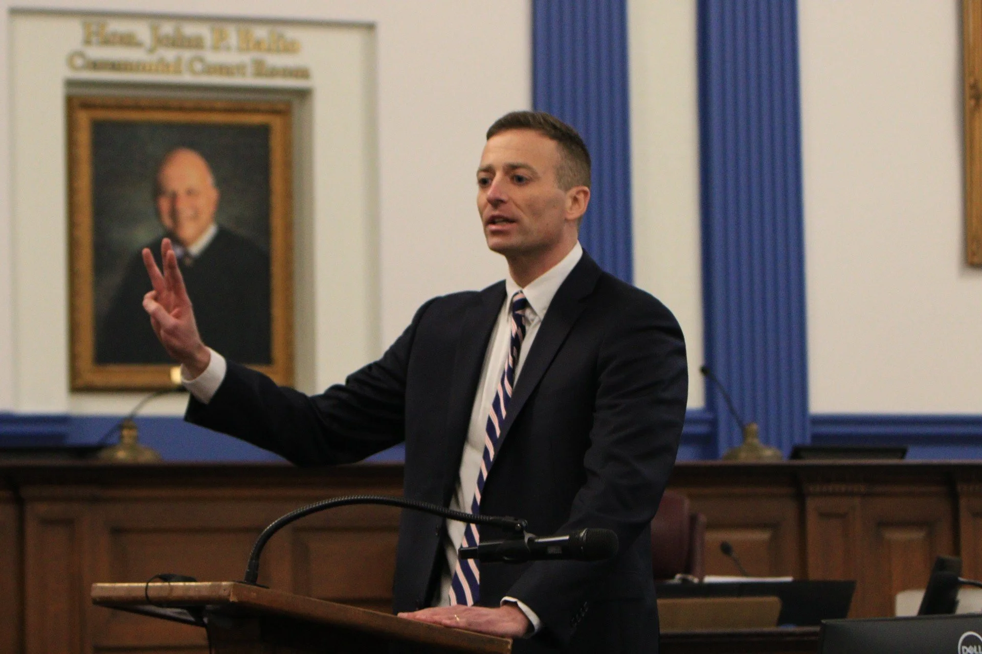 Scott Iseman at the lectern during a New York jury trial